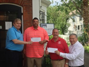 Pictured above is firm partners Kevin Wystup (left), and Dave Mackowiak (right) presenting Fredonia Little League President, Chad Bongiovanni and Dunkirk Little League President, Gary Haase checks for $500.00 each to help support the youth baseball organizations. 